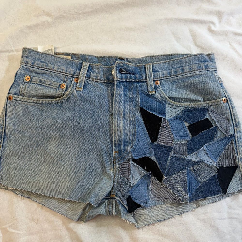 Vintage upcycled Levi's Patchwork Light Blue Denim Shorts Size 32